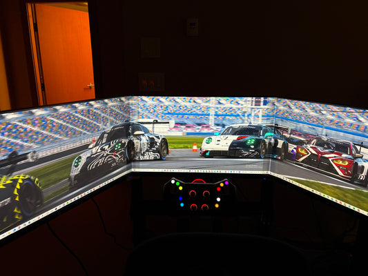 Racing simulator setup with our bezel free kit connecting the screens
